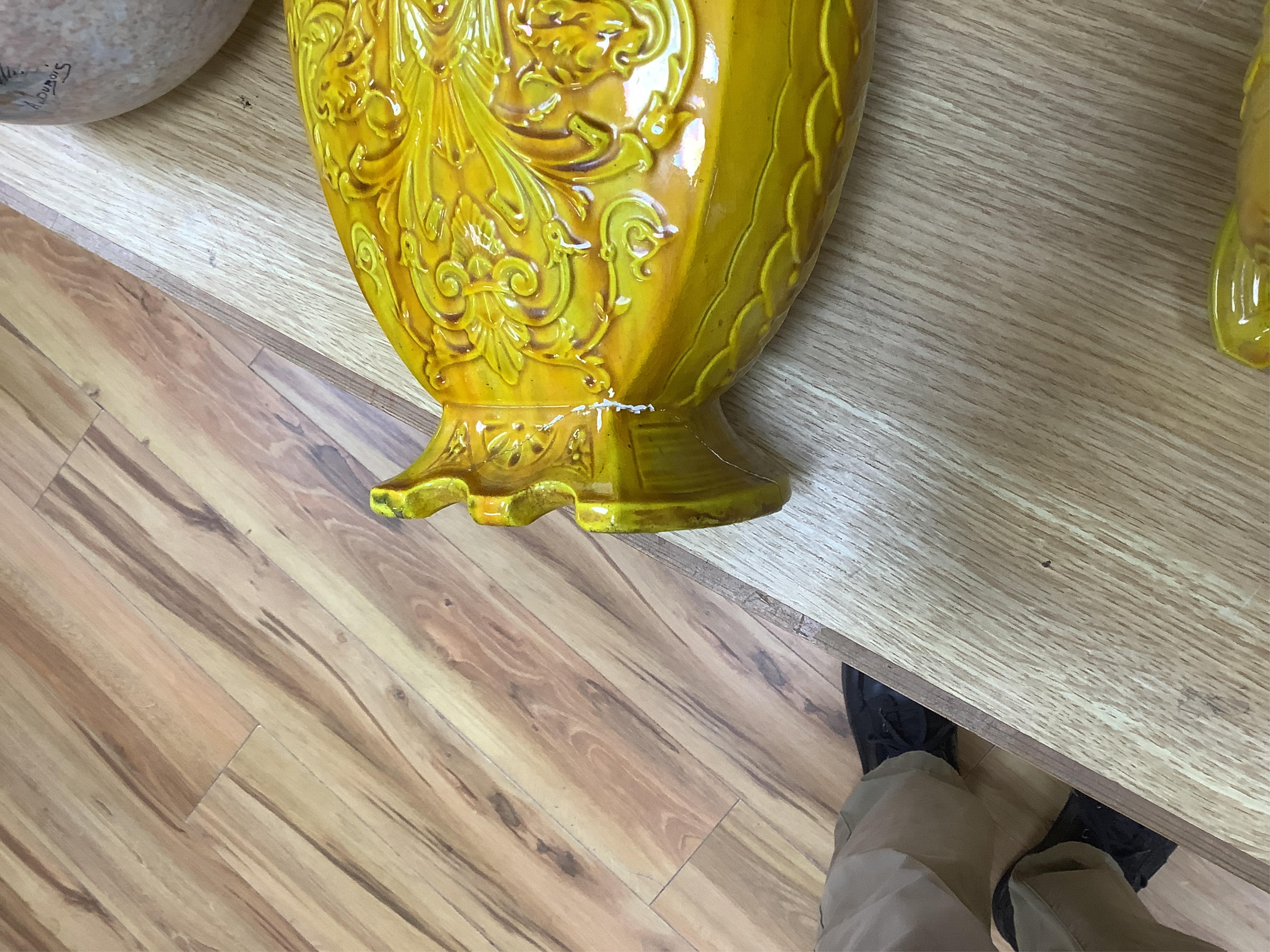 A pair of late 19th century Majolica yellow glazed vases, mounted as table lamps, marked ‘W & Co’ to base, 47cm total